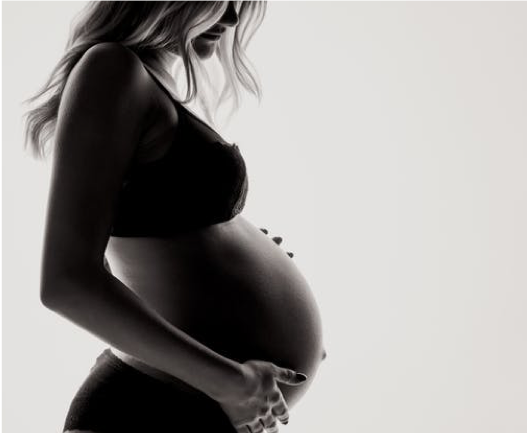Pregnant woman in her third term of pregnancy