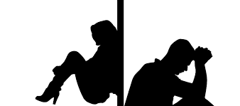 Silhouette of two persons sitting across from each other. They are facing away from each other and there is a wall between them.