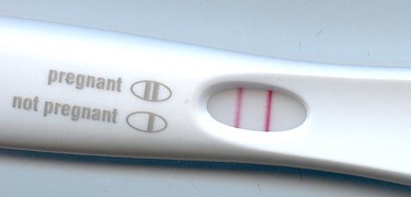 A positive pregnancy test. 