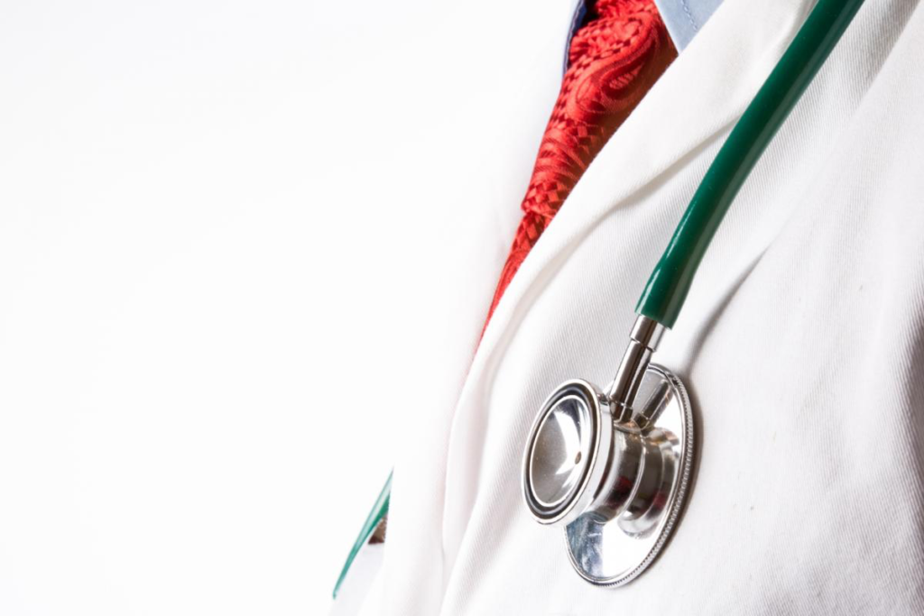 Stethoscope on white doctor's coat 