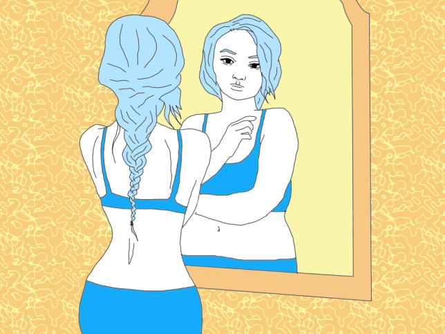 Person looking at themself in a mirror. 