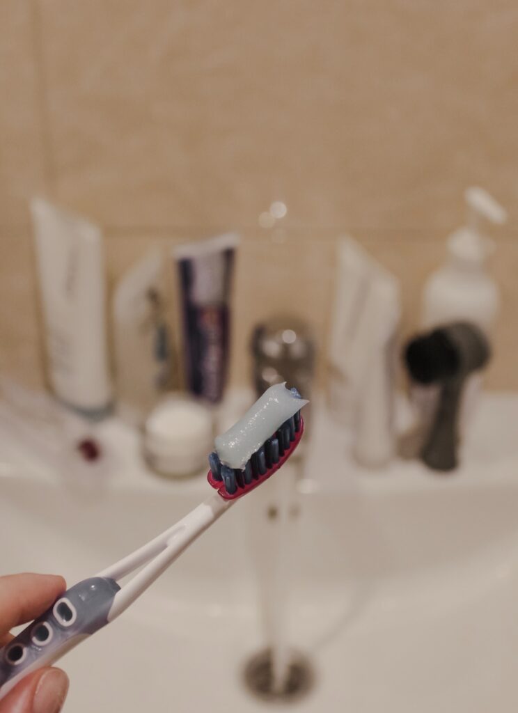 A toothbrush with toothpaste.