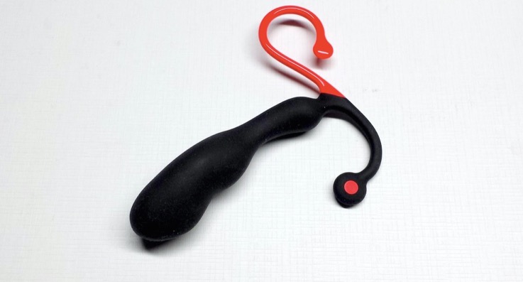 A black and red prostate massager.