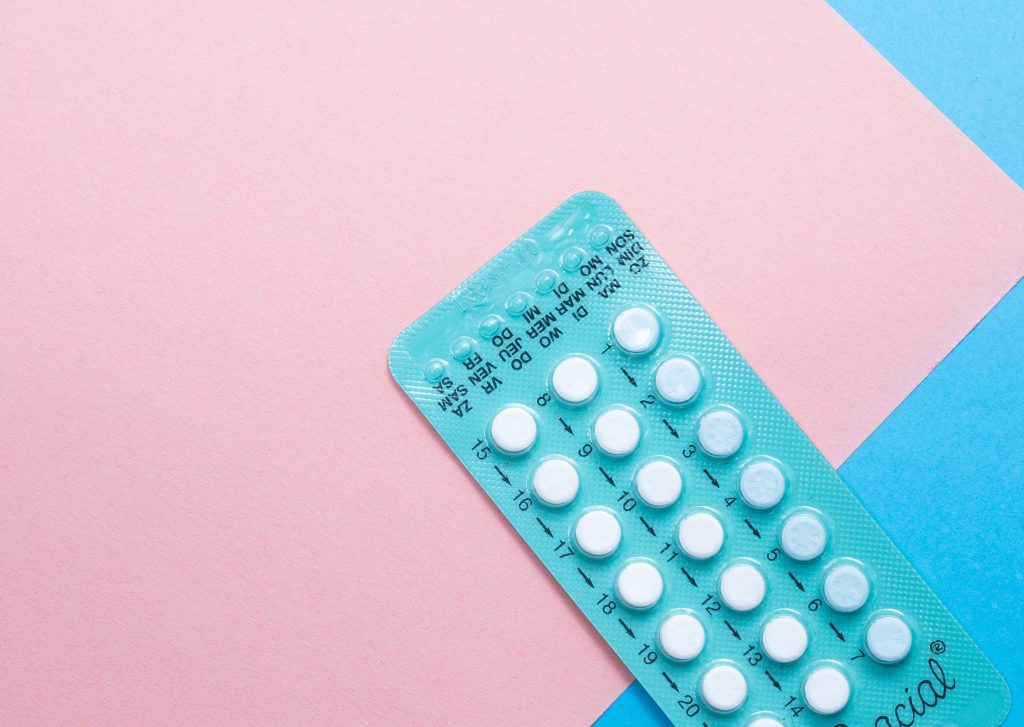 Birth control pills in blue packaging.