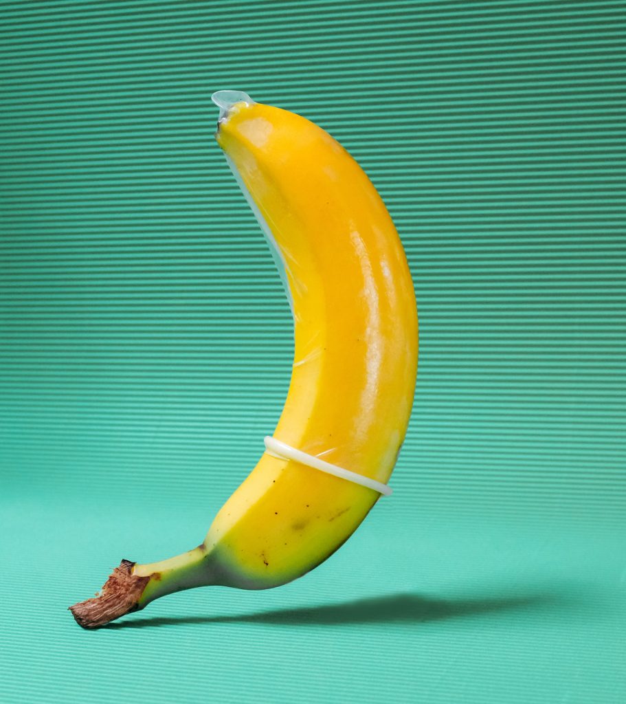 A banana wearing a condom.