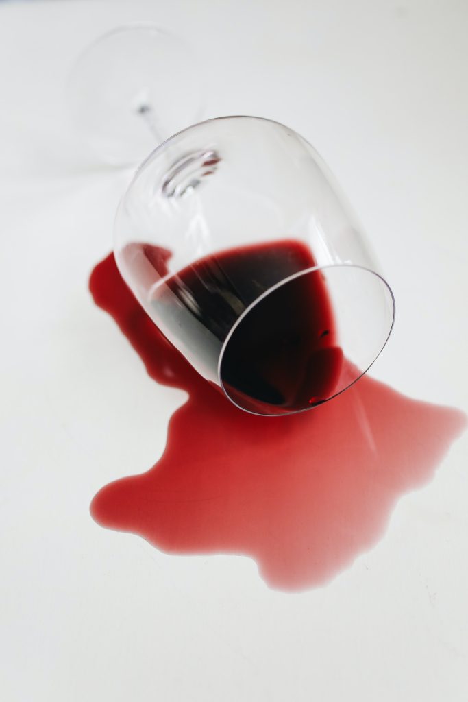 A spilled glass of wine.