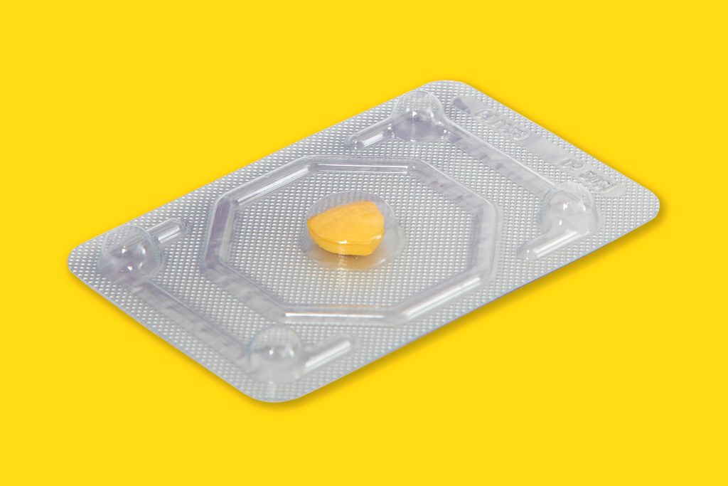 One yellow pill.