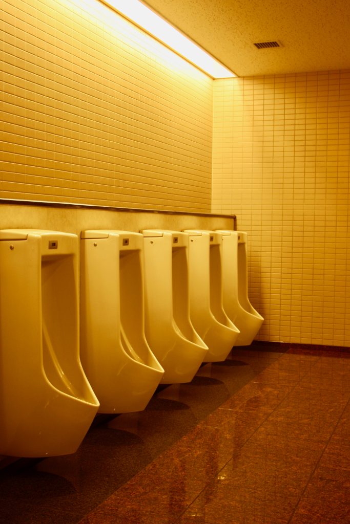 Five urinals.