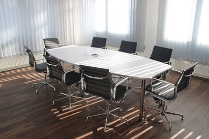 A conference table with chairs.