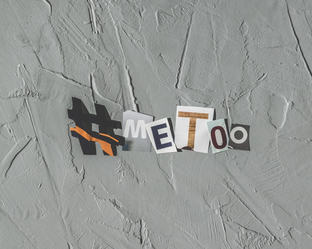 "#MeToo" spelled out from magazine paper.