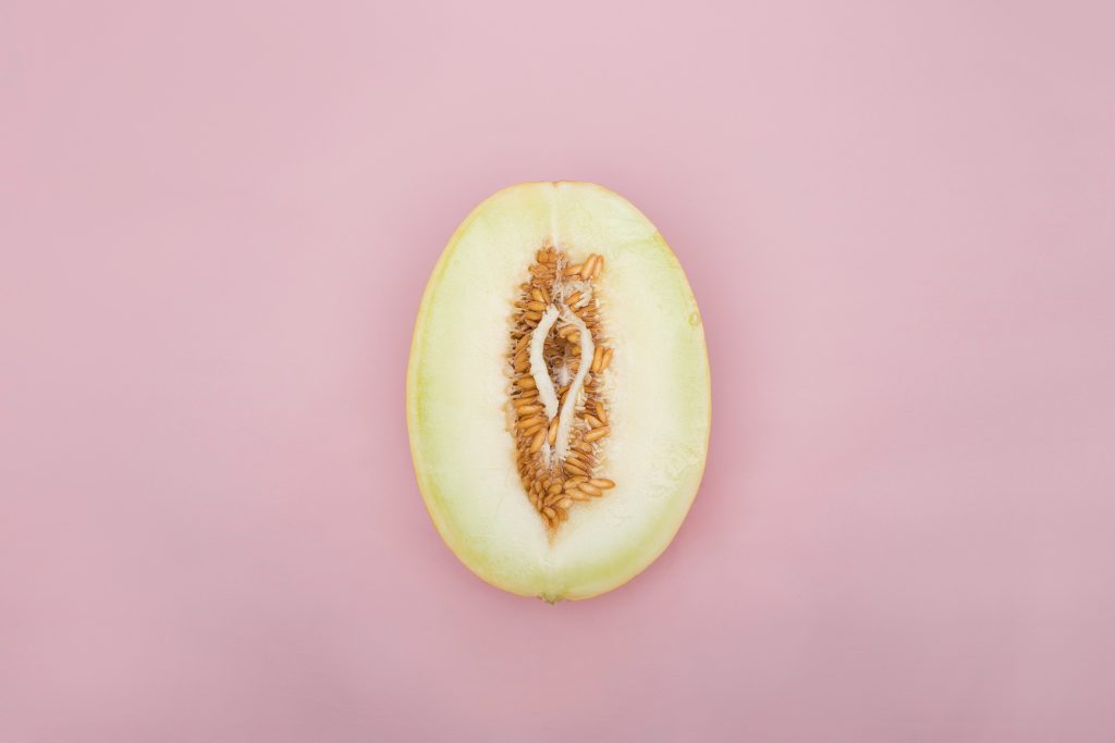 A melon with seeds surrounding the middle melon flaps that resemble a vagina.