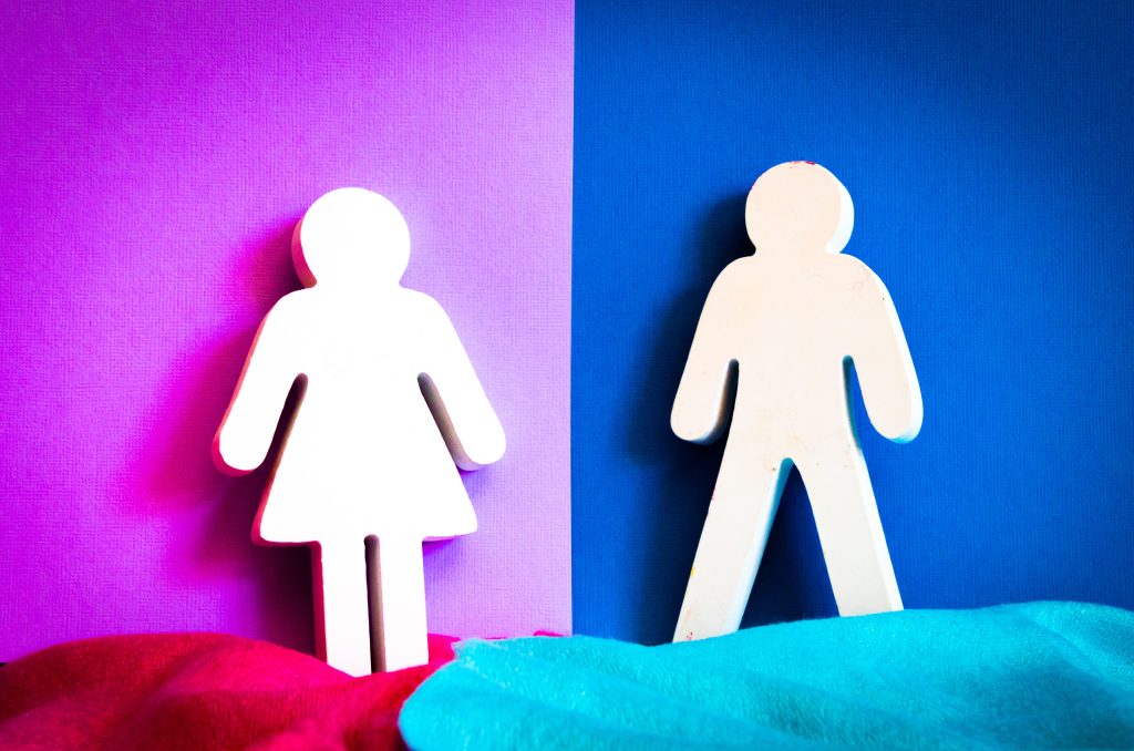 A figure of a woman with a purple background, next to a figure of a man in front of a blue background.