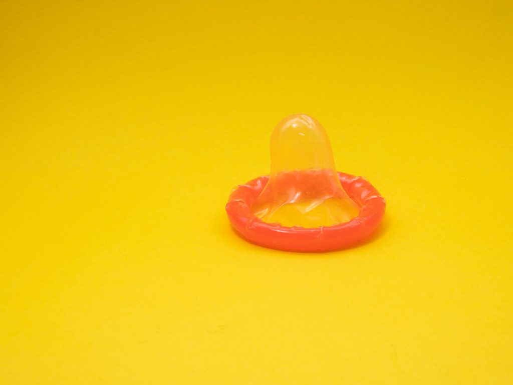 An orange condom.